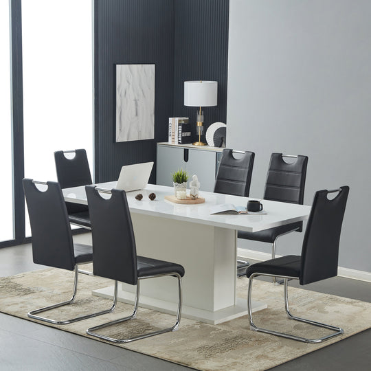set of four black pvc dining chairs with curved backrest and handle-modern design with sturdy metal legs for dining or office use