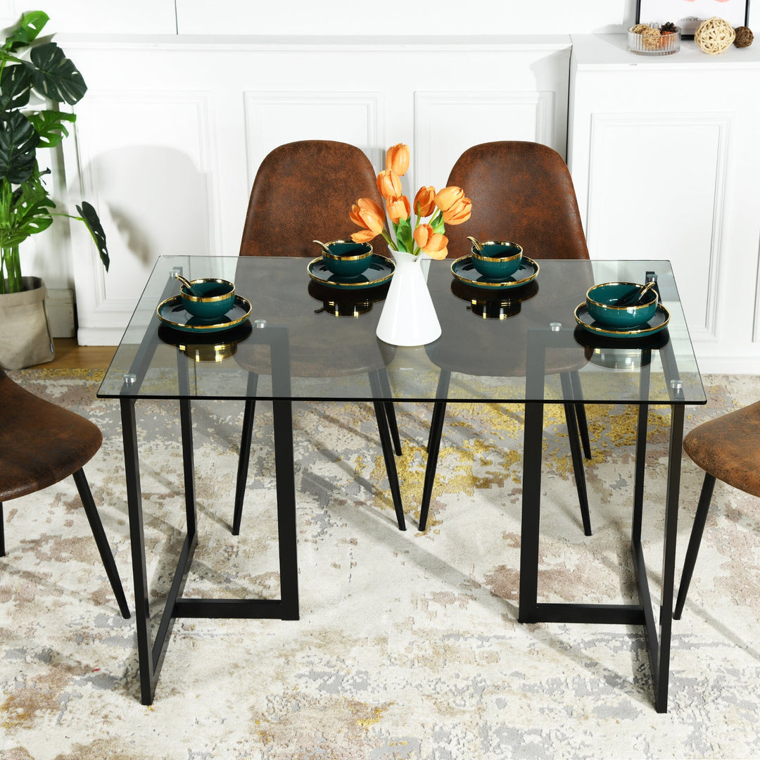 Slip Glass Dining Table – Sleek Glass Top, Metal Base, Modern Design