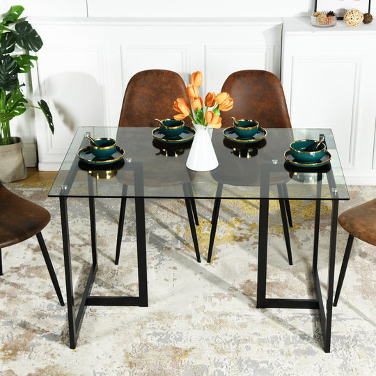 Slip Glass Dining Table – Sleek Glass Top, Metal Base, Modern Design